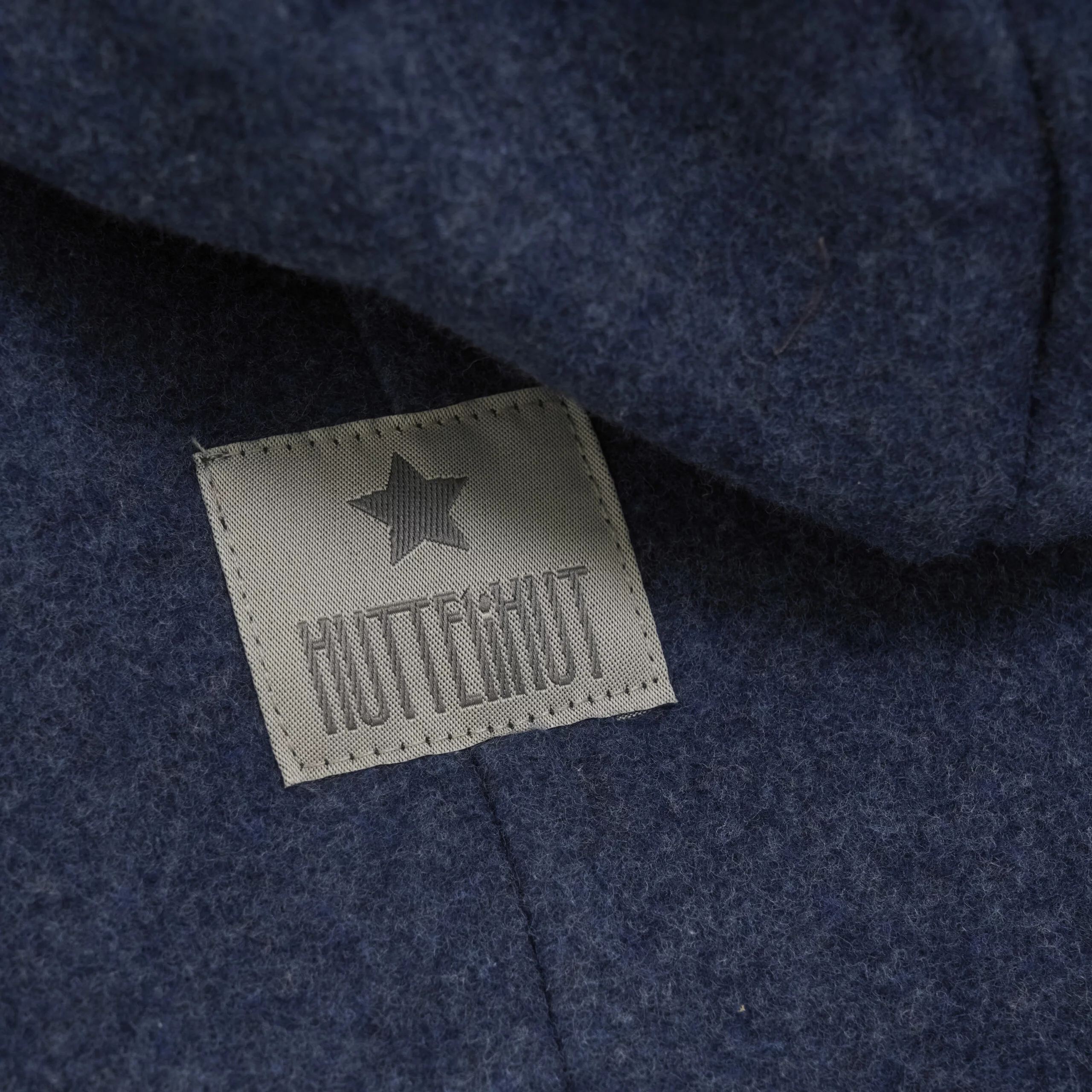 Kombinezon z wełny Merino Huttelihut Navy Melange Niebieski 100% wełna